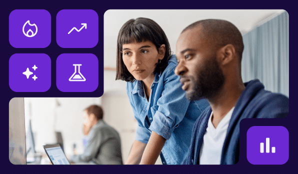 Coworkers standing and analyzing data